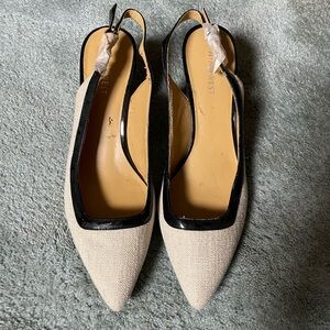 9 West pumps - never worn.  Beige with black trim.  Size 6.